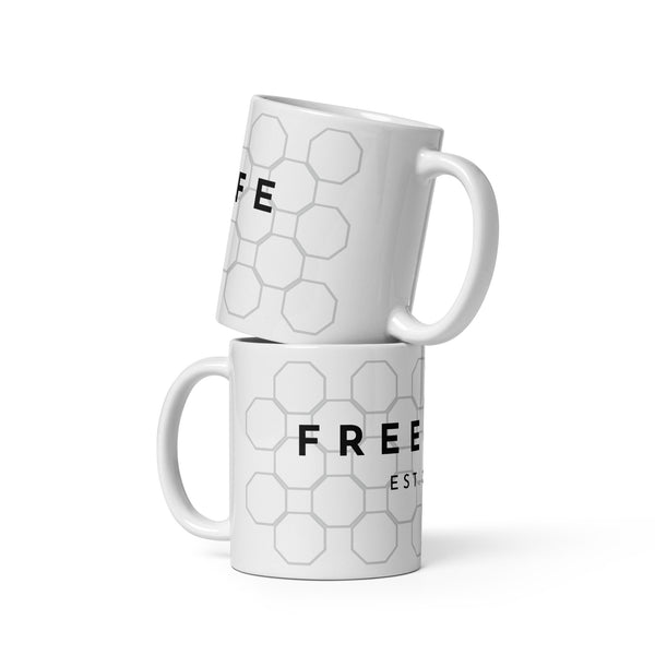 FREE LIFE LLC. White glossy mug